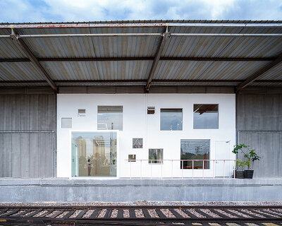 layered transparent walls transform former railway warehouse in shenzhen