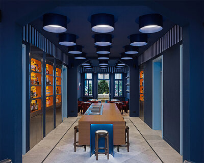 mirrored ceilings and textured glass shape club amis’ layered interiors in beirut