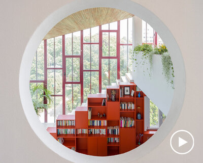 pop colors animate geometric interiors within renovated 1960s apartment in italy