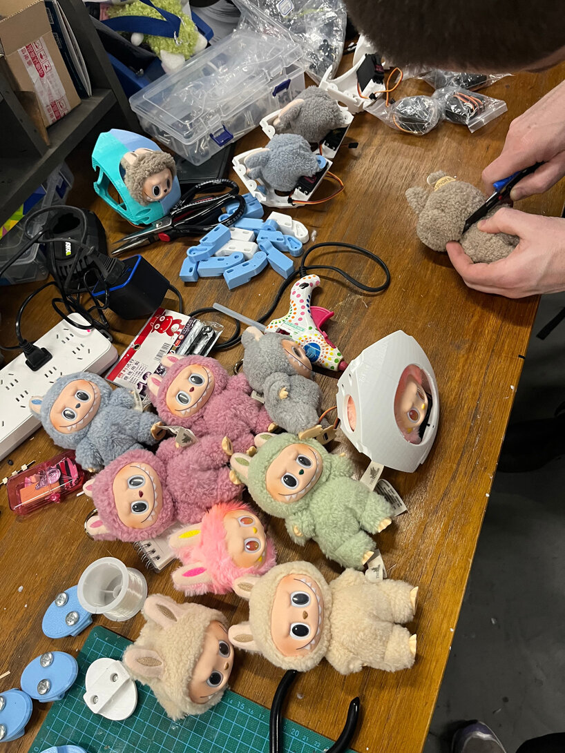 meet labububot, MIT’s rolling franken-robot composed of twelve labubu heads - 10