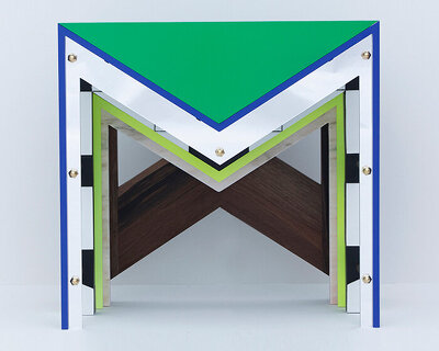 a sculptural side table inspired by handwritten love letters and the letter M
