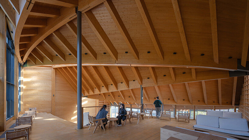sweeping timber roof crowns a workshop reviving rural craft traditions in china - 10