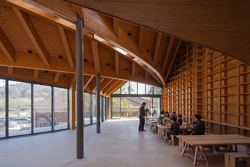 sweeping timber roof crowns a workshop reviving rural craft traditions in china - 11