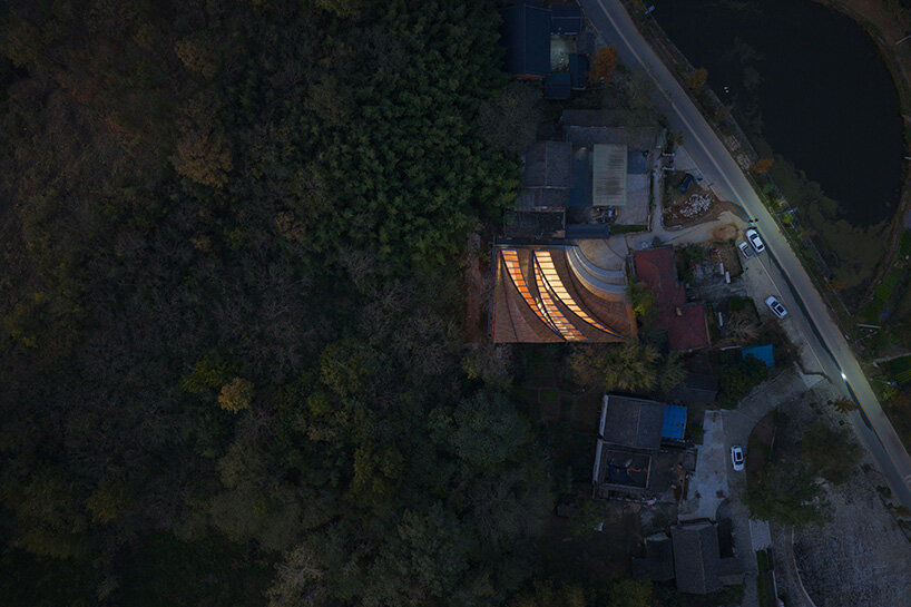 sweeping timber roof crowns a workshop reviving rural craft traditions in china - 14