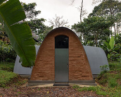 made of earthen adobe vaults, al borde’s biology lab rises from the amazonian rainforest