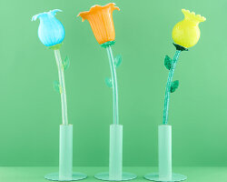 six murano glass flowers turn into portable table lamps that glow at a touch