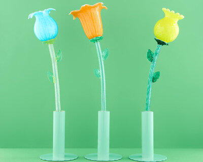 six murano glass flowers turn into portable table lamps that glow at a touch