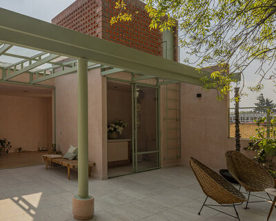 amasa estudio carves patios and millwork into a mid-century home in mexico city