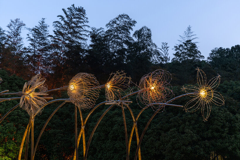 woven bamboo canopy forms floral field bending over sunken urban plaza in shanghai - 13