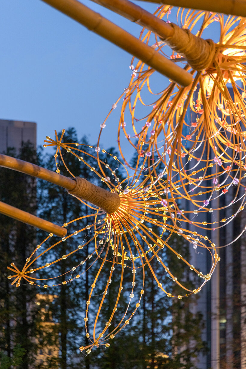 woven bamboo canopy forms floral field bending over sunken urban plaza in shanghai - 14