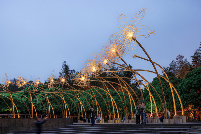 woven bamboo canopy forms floral field bending over sunken urban plaza in shanghai - 12