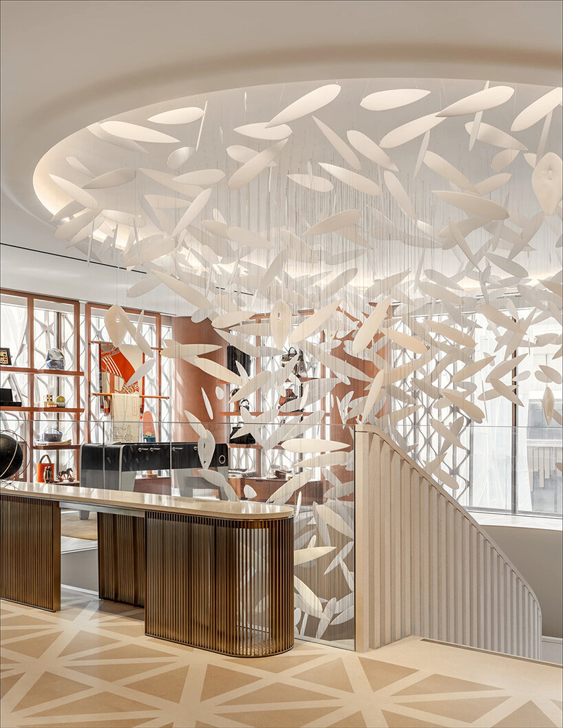 Hermès beijing flagship wrapped in a rose-pink ceramic veil by mamou-mani - 1