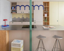NOT A STUDIO uses color-coded structure to open up century-old barcelona apartment