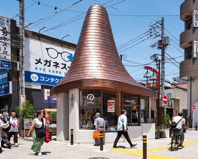 sculptural copper canopy tops micro-landmark community hub in tokyo by nikken sekkei