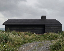 monolithic black timber retreat frames panoramic views of ukraine's carpathian mountains