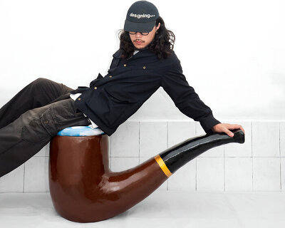 this is not a chair: reimagining magritte’s iconic pipe as seating object