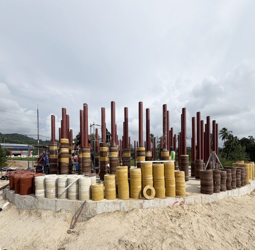 a tower made from elephant-dung bricks by boonserm premthada rises in southern thailand - 5