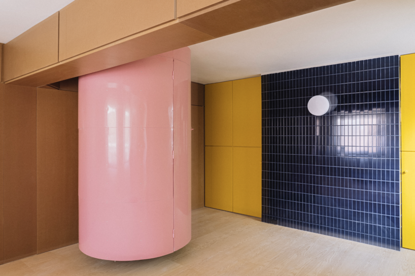 BURR renovates madrid apartment with yellow storage walls and pink spiral staircase - 4