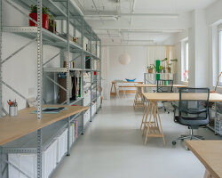 curved curtain and modular furniture reshape shanghai interior workshop and pop-up