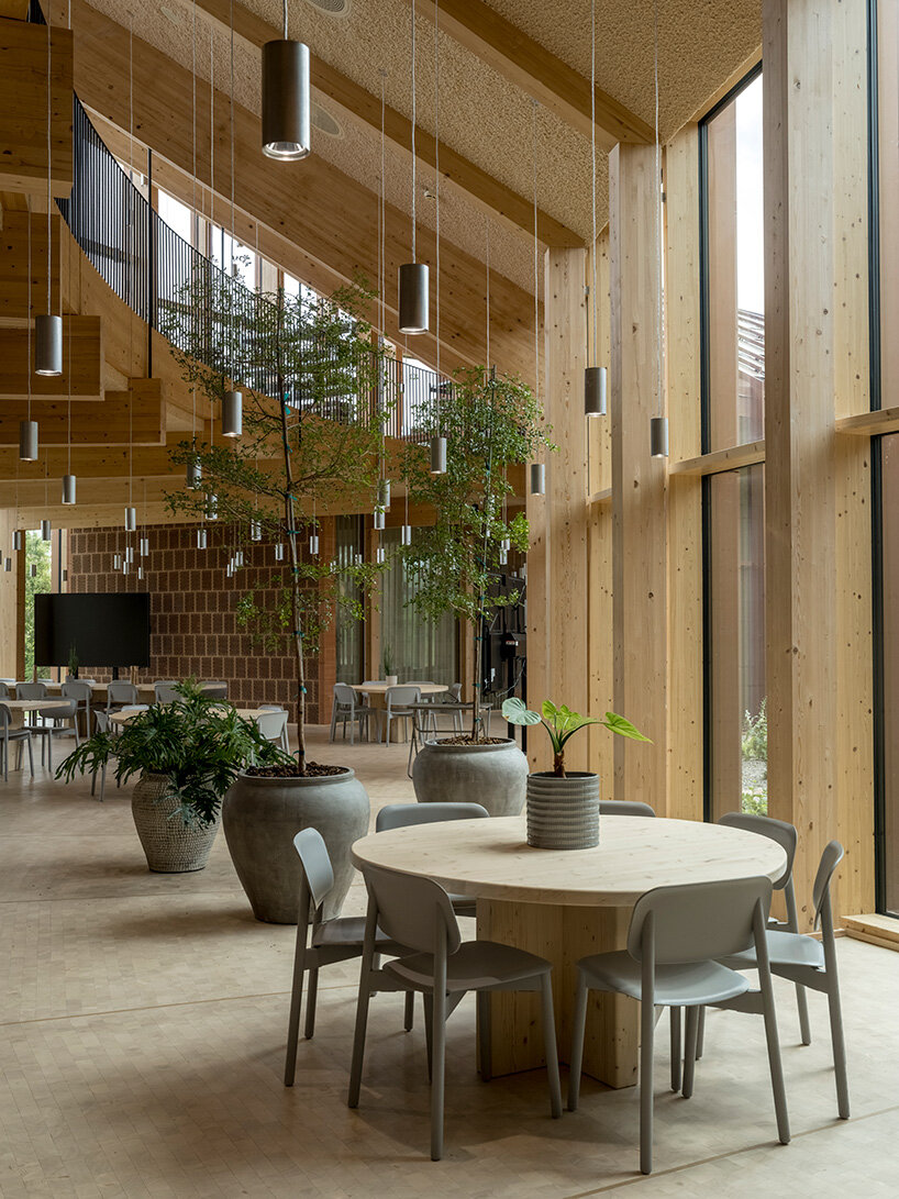 BIG completes dymak's HQ as a full-scale showcase of natural materials in denmark - 5