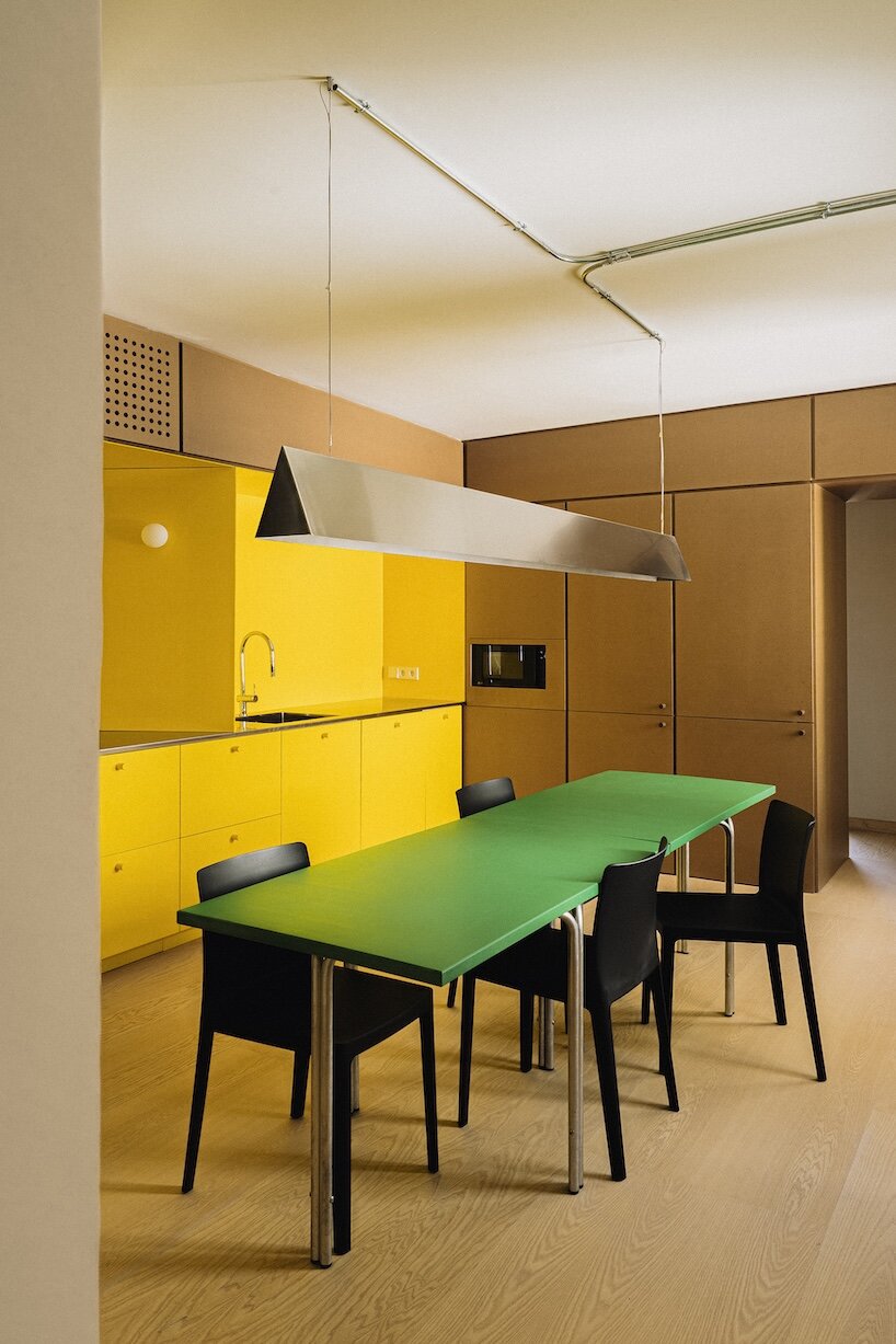 BURR renovates madrid apartment with yellow storage walls and pink spiral staircase - 7