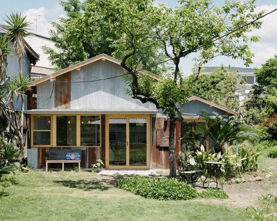 coil kazuteru matumura converts hidden timber outbuildings into shared kitchen in osaka