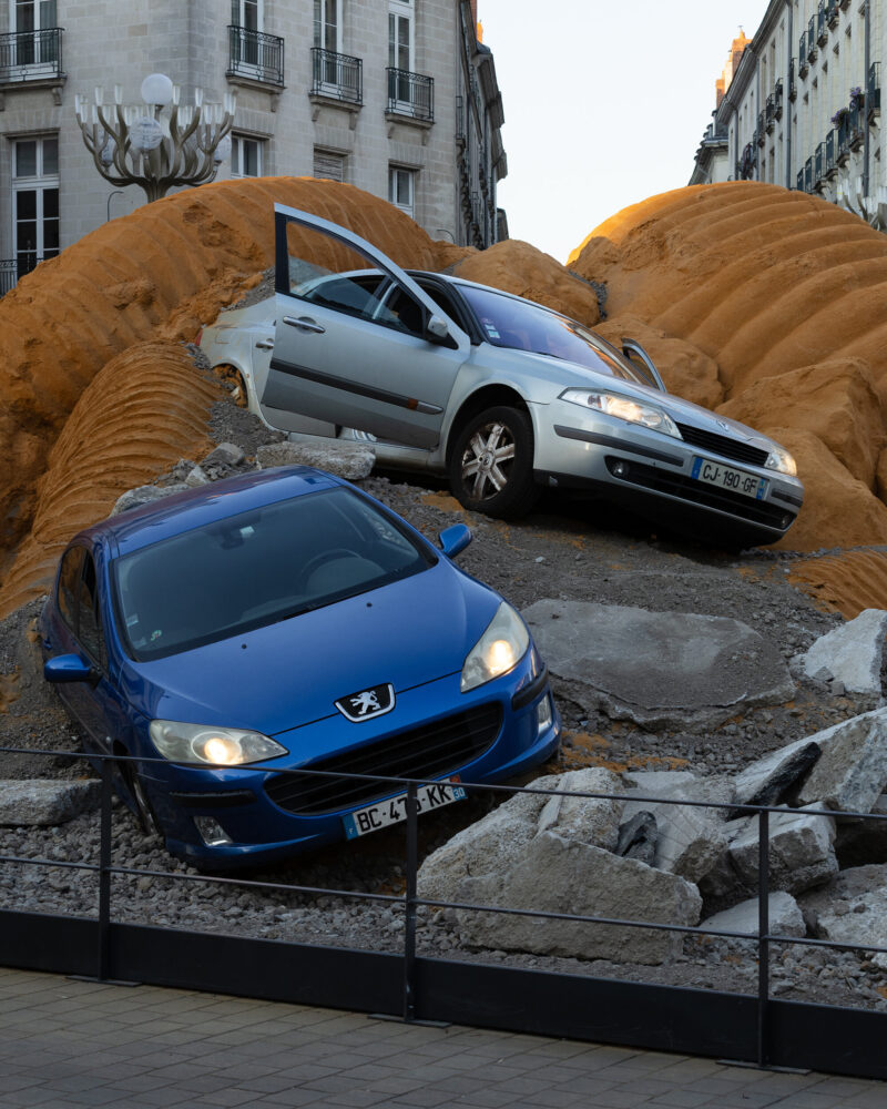 crushed cars emerge from monumental archaeological landscape in 'fossil opera' - 4