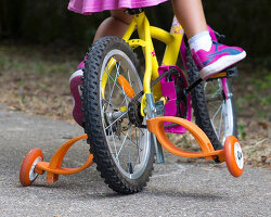 flexible bicycle stabilizers let children learn balance before losing the training wheels