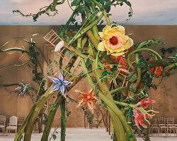 giant flowers and twisting vines shape bureau betak's enchanted garden for chanel