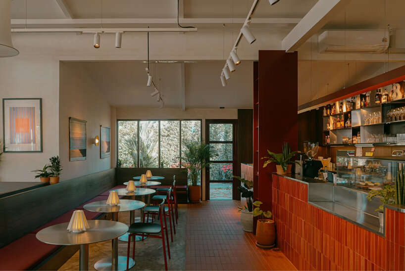 lantern-like pavilion and recycled brick bar reshape bangkok house into arvie restaurant - 7