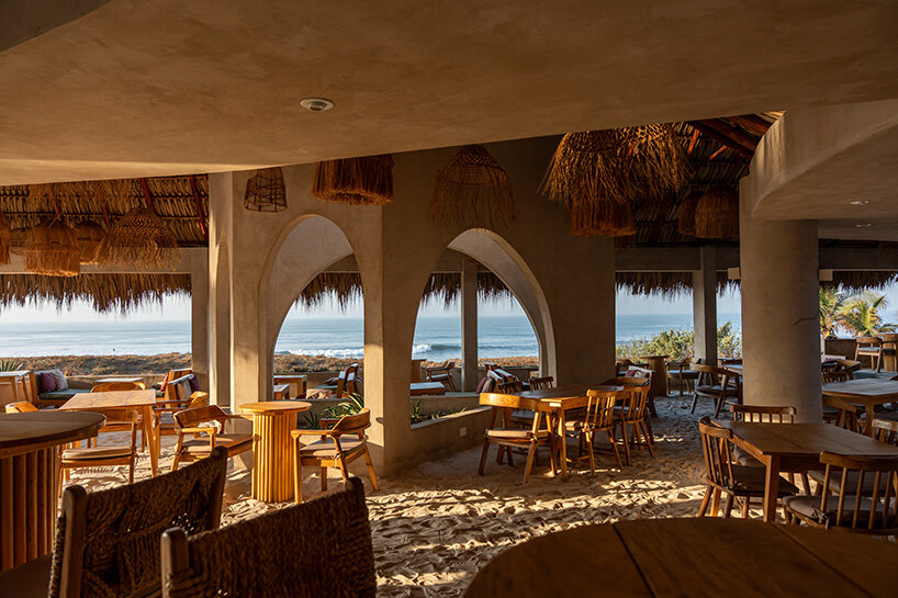 gris shapes naturally cooled beach club around series of open-air pavilions in guatemala - 12
