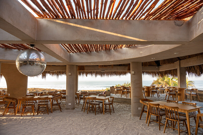 gris shapes naturally cooled beach club around series of open-air pavilions in guatemala - 7