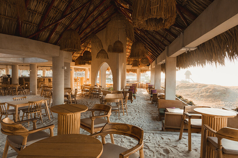 gris shapes naturally cooled beach club around series of open-air pavilions in guatemala - 9