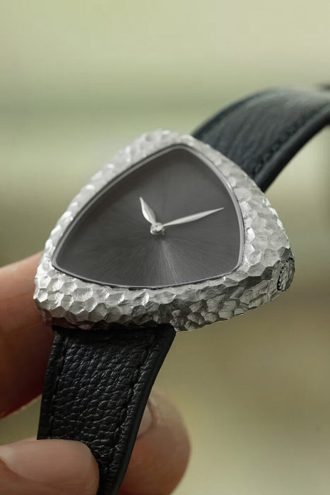 this hand-chiseled watch takes cues from ancient stone tools collected by brâncuși - 5