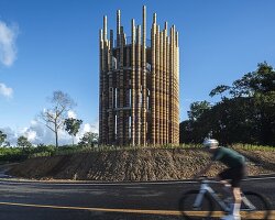 a tower made from elephant-dung bricks by boonserm premthada rises in southern thailand