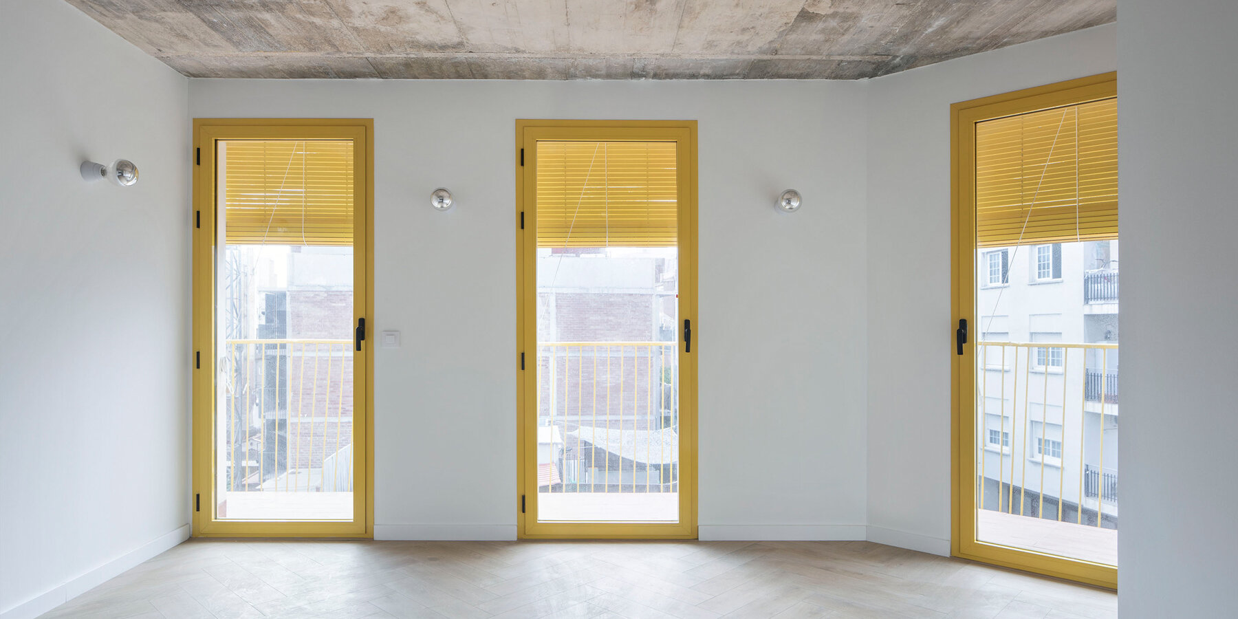 l-hospitalet-de-llobregat-marti-julia-m-i-r-a-rehabilitation-corner-building-apart-hotel-yellow-designboom-1800-2