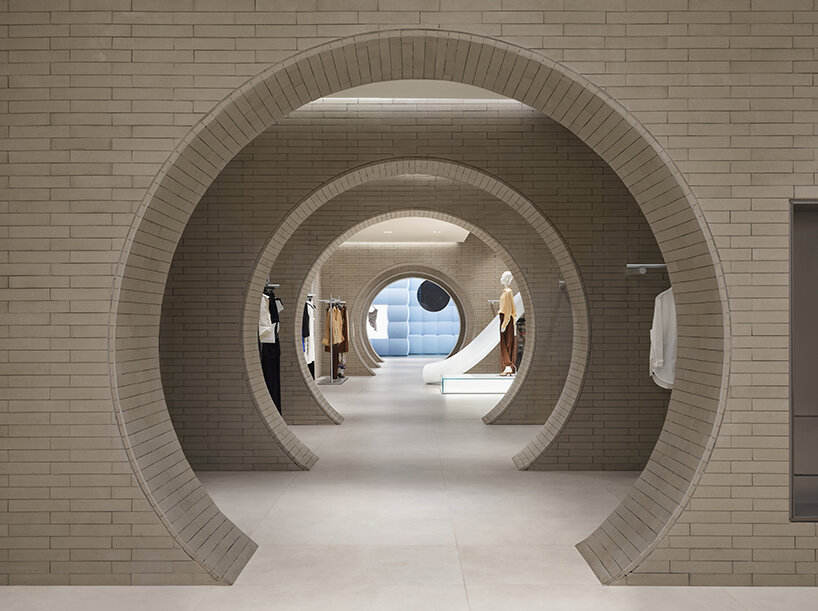 MVRDV wraps urban revivo's beijing flagship in color-shifting roof tile facade - 7