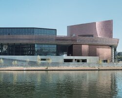 a new art center will open on paris' île seguin in october, designed by RCR arquitectes