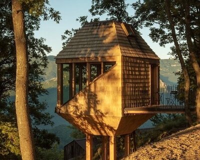officina82 reimagines traditional italian hay barn as timber treetop retreat in ligurian alps