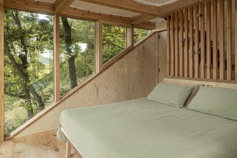 officina82 reimagines traditional italian hay barn as timber treetop retreat in ligurian alps - 7