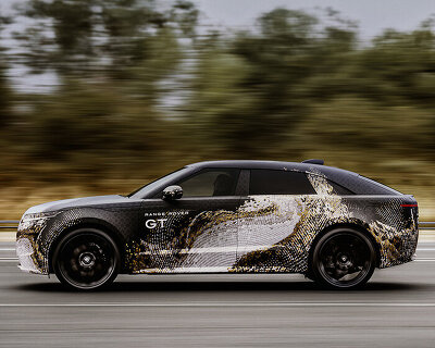 topographic camouflage traces the low-slung form of range rover’s new electric GT