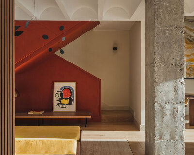 red microcement pairs with onyx marble to reframe brutalist barcelona duplex