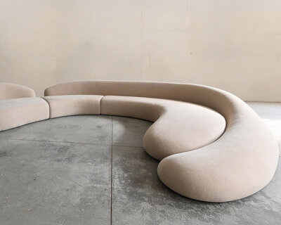 soft monolithic forms shape a modular furniture collection in nubuck, alpaca, and oak