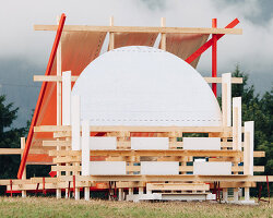 a terraced timber pavilion explores circular construction for austria's gabonsa music festival