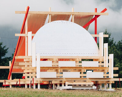 a terraced timber pavilion explores circular construction for austria's gabonsa music festival