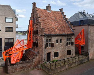 studio frank havermans frames 500-year-old dutch house with timber scaffolding structures