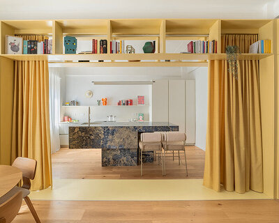 folded yellow volume reorganizes genova apartment’s interiors like a game of tetris