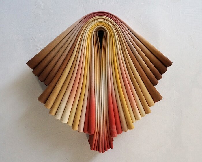 where folded canvas carries the memory of the hand: susan maddux