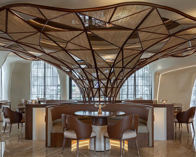 falwa restaurant transforms arabian equestrian heritage into fluid architectural interior