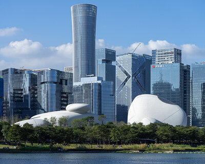 MAD's stone-like museum completes across shenzhen bay’s green shoreline